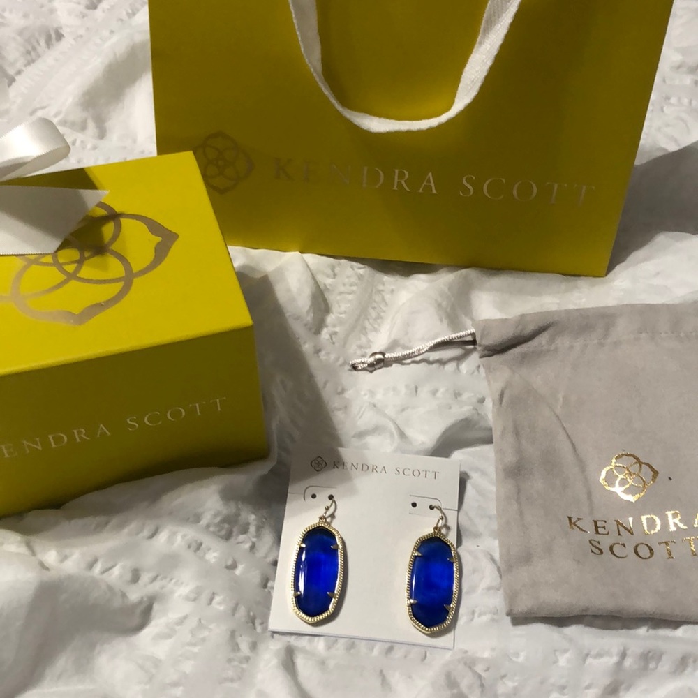 Kendra Scott Gold Drop Earrings in Navy Cat Eye.